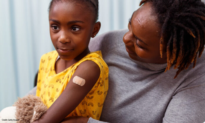 Mother and Daughter Applying Vaccine